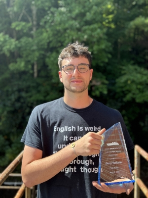 Ben Pipitone holding his 1st place Trophy in the Robert Bruce Thompson Lighting Competition.