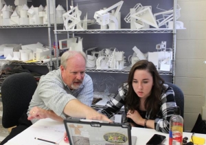Associate Professor Alex Poorman, who was recently awarded the IFDA Education Foundation's Irma Dobkin Universal Design Grant, works with second year student Alanna Wilson. Photo by Meghan McCandless