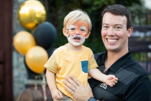 Dr. David English '04 '06 enjoys Homecoming 2018 with his son Harrison. Photo by Chase Reynolds